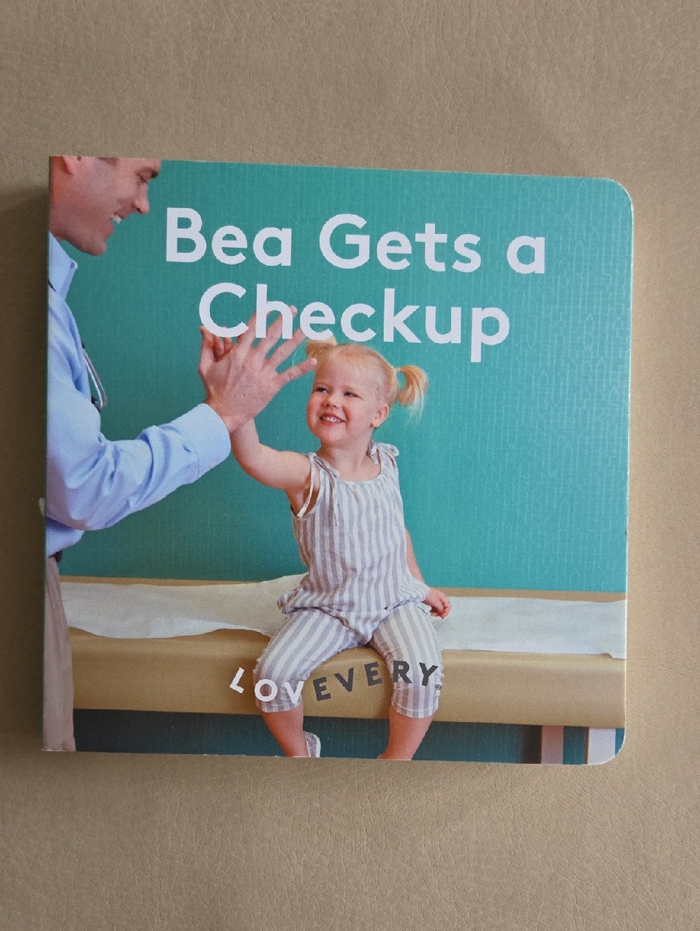 Lovevery Bea Gets a Checkup Board Book  Months 19, 20, 21+
